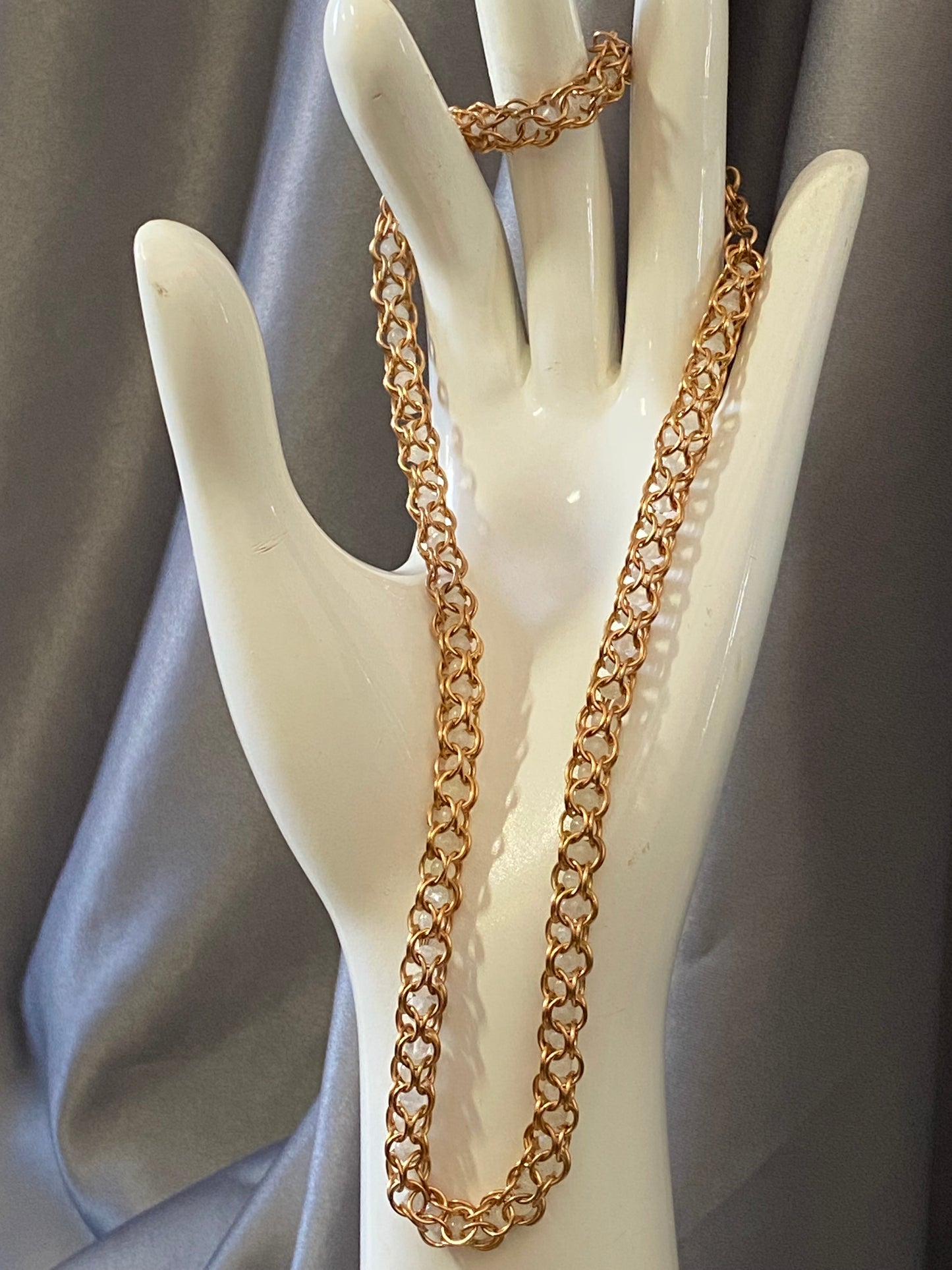 Bronze necklace with captive moonstone beads, 20 inches long