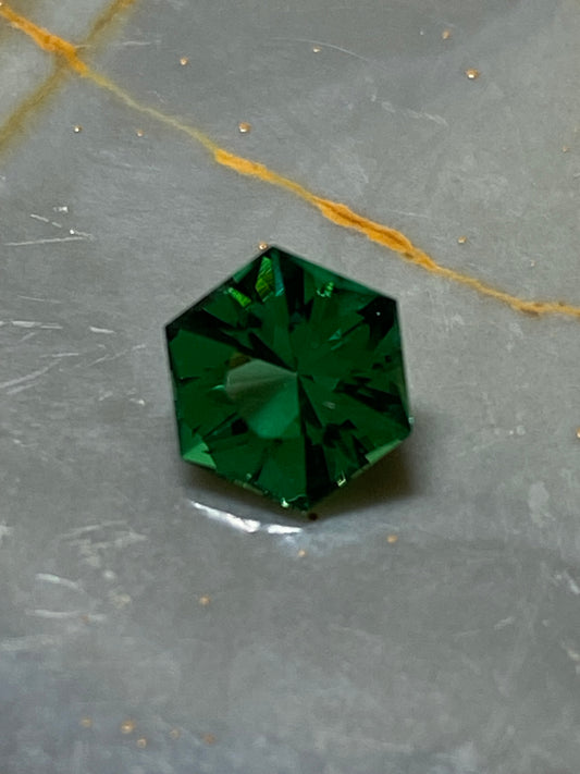 Faceted Helenite hexagon, 1 Carat, 6.1 MM