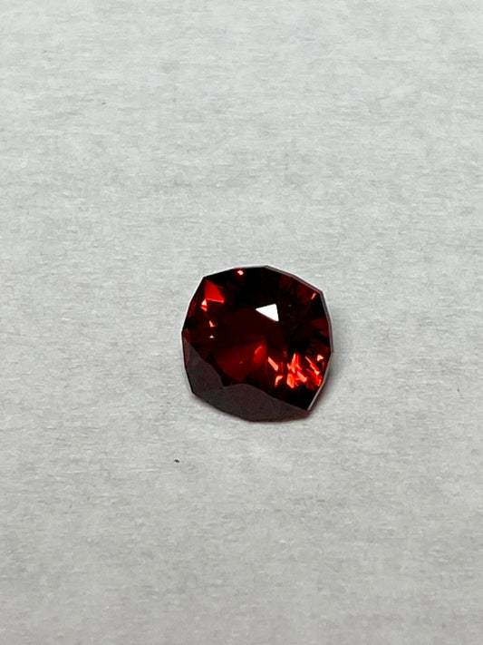 Cushion cut red Garnet, 5.1 MM .77 Carat
